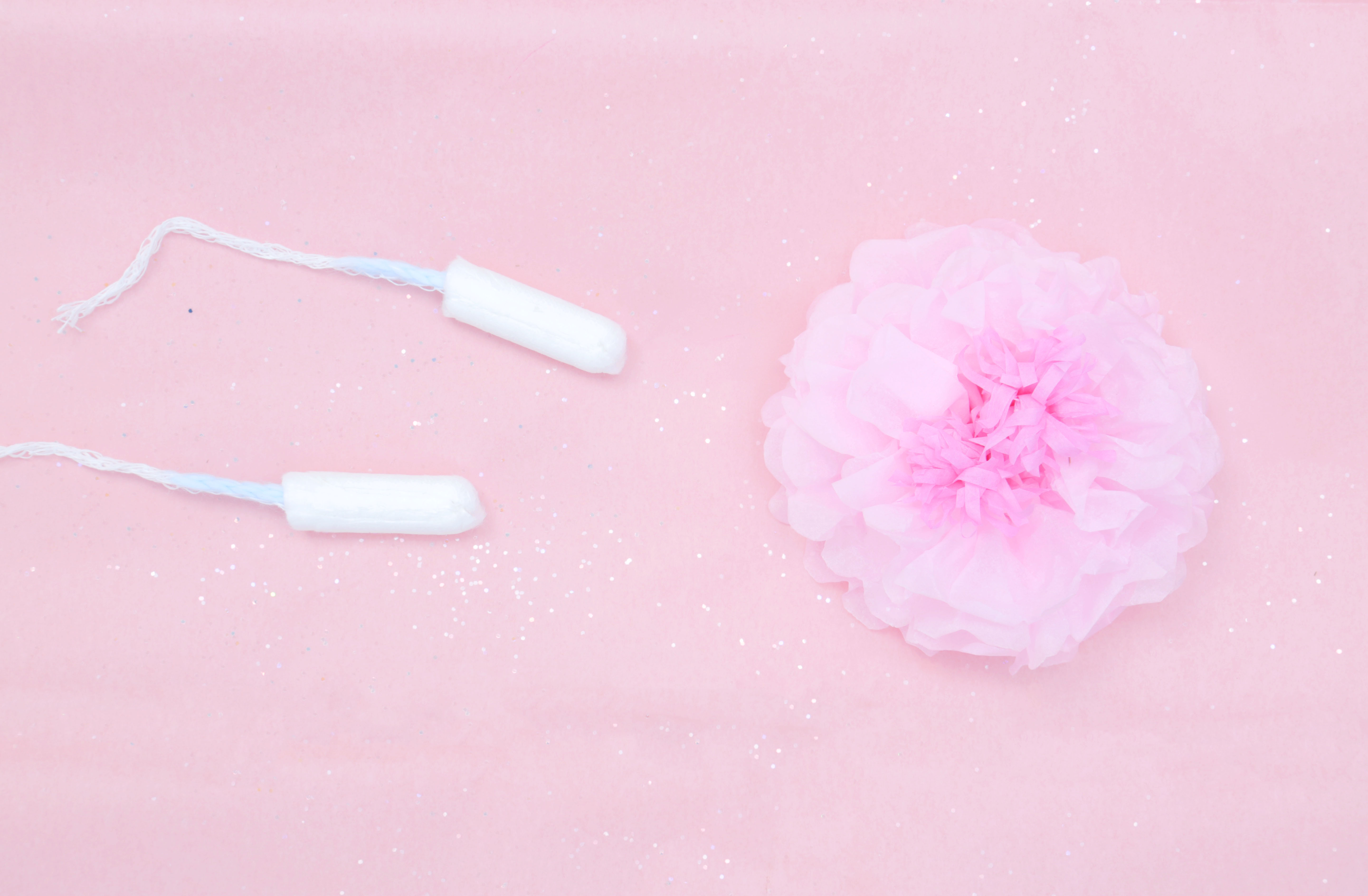 two tampons and a flower
